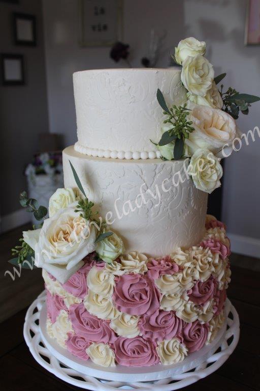 Wedding Cake with Blush and Ivory Rosettes